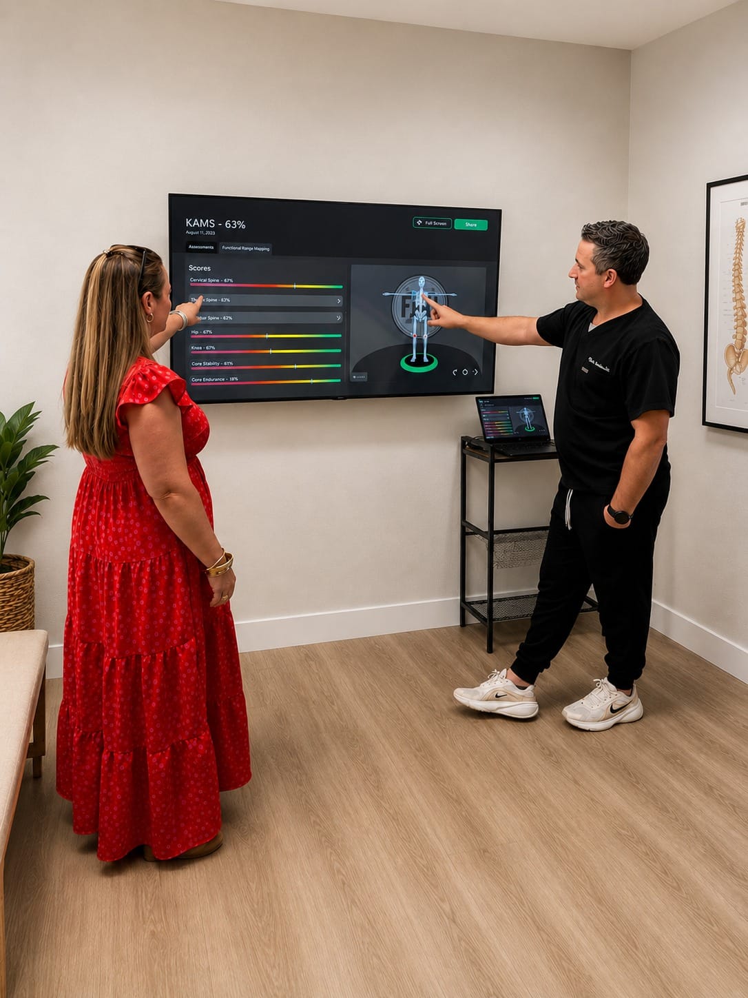 Dr. Lovelace reviewing Kinetisense 3D movement assessment results with a patient